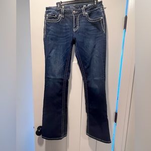 Miss Me dark blue boot cut jeans. Almost new